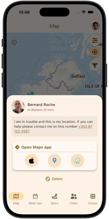 Tapping a distress marker shows the rider's message and buttons to open Apple Maps, Google Maps, or Waze